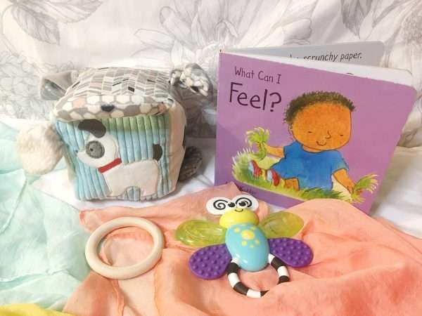 baby gift box of books and toys for five month old