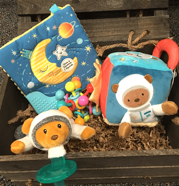 luxury baby gift of astronaut baby toys in a wooden box
