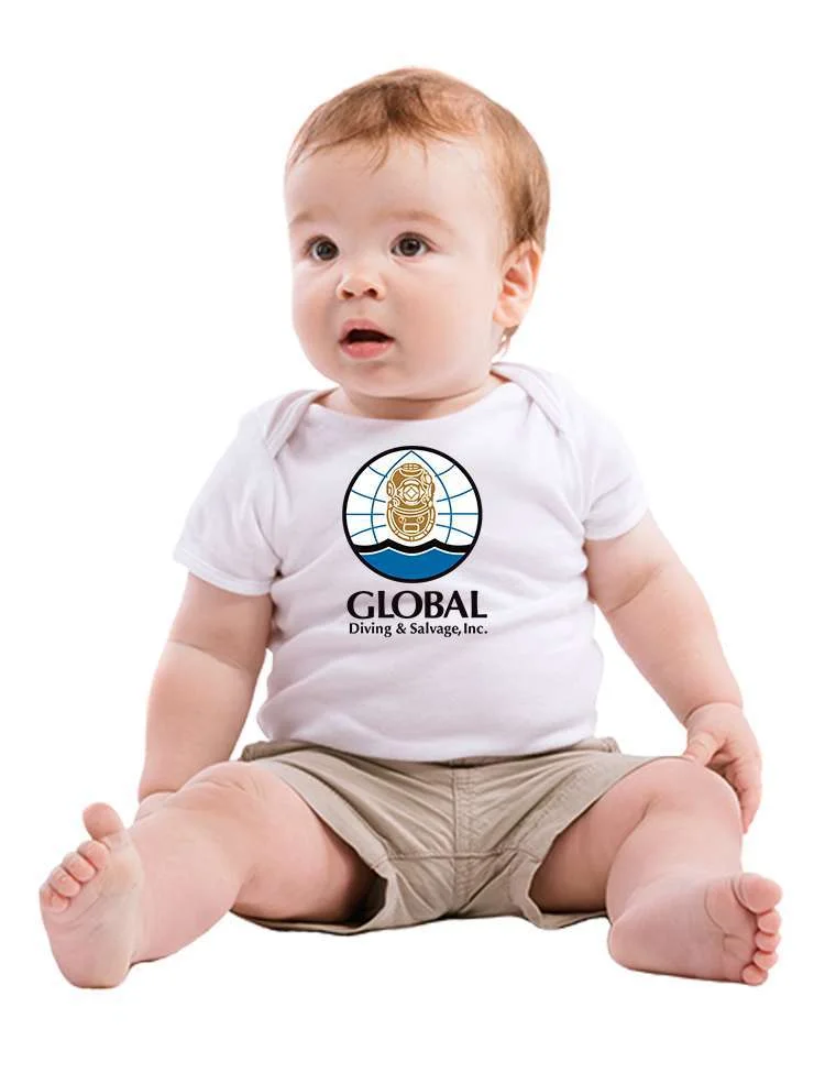 baby seated on the floor and wearing a white shirt with a company logo on the front as a corporate baby gift