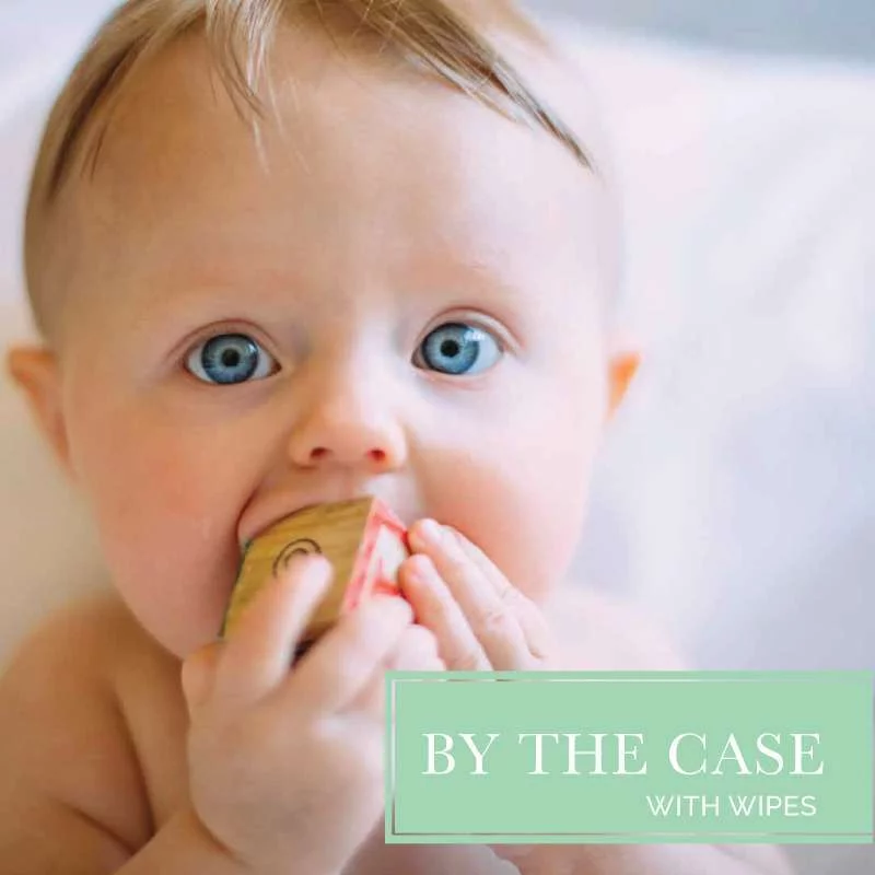 baby face holding a toy in its mouth used to advertise diaper subscription service that pays by the month