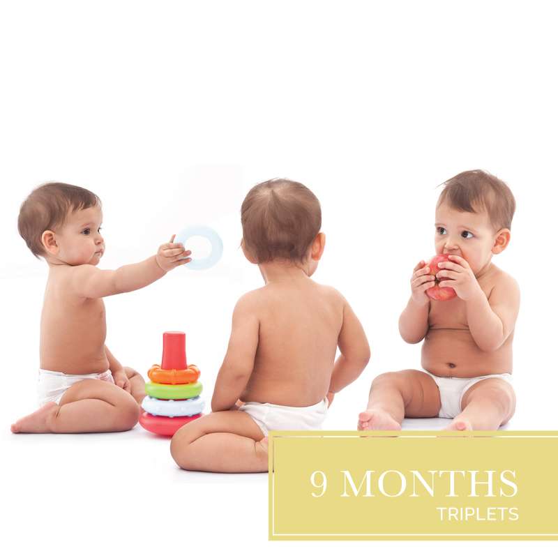 3 triplet babies playing with toys used to advertise our 9 month diaper subscription for triplets