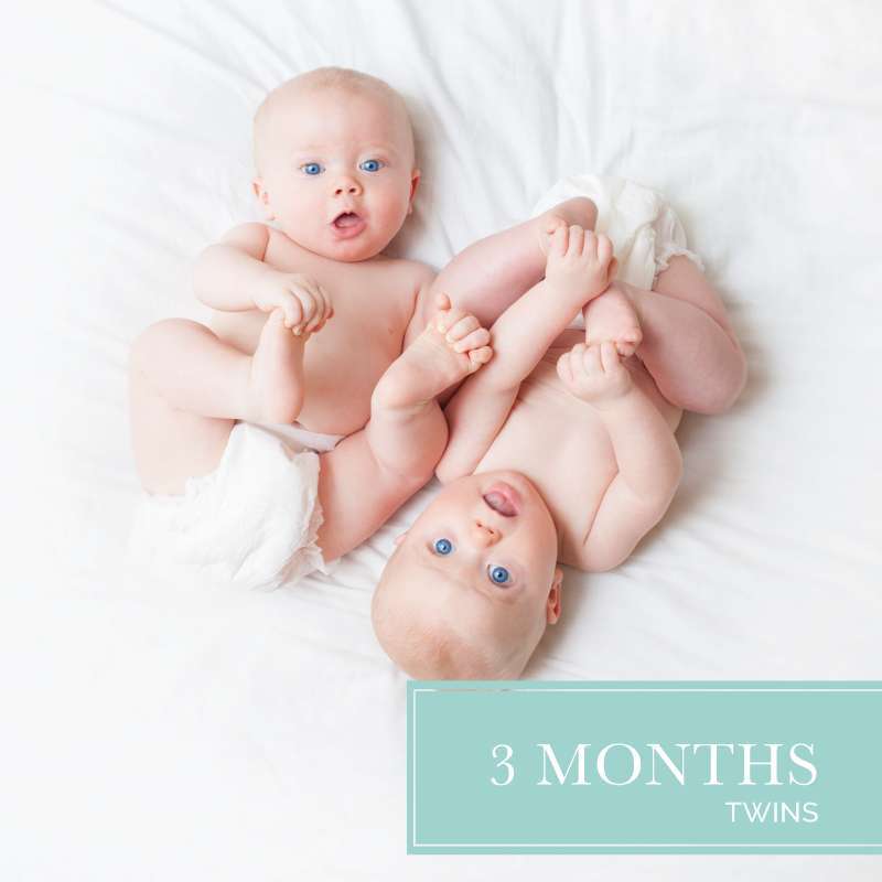 two babies in diapers laying on bed, used to advertise our 3 month diaper subscription for twins