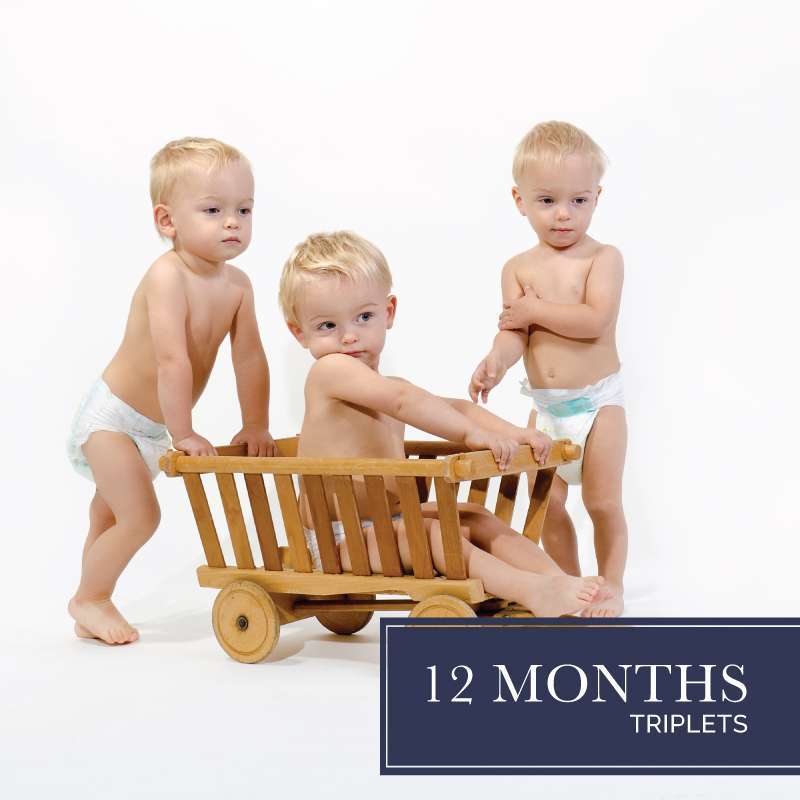 triplet babies in diapers used to advertise our 12 months diaper subscription for triplets