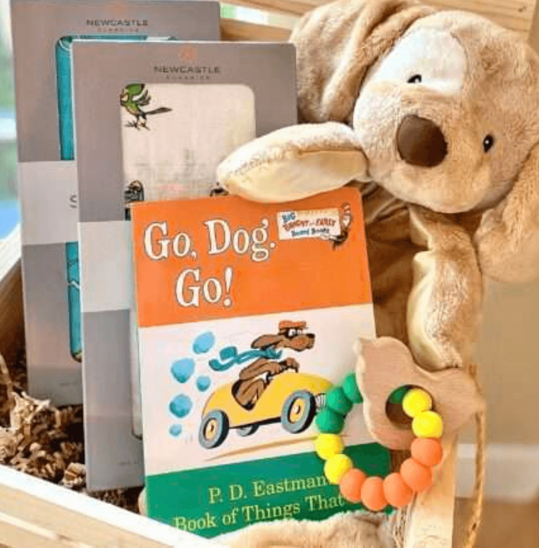 Baby gift in wooden crate with go dog go book, swaddles with go dog go print and rattle and plush dog