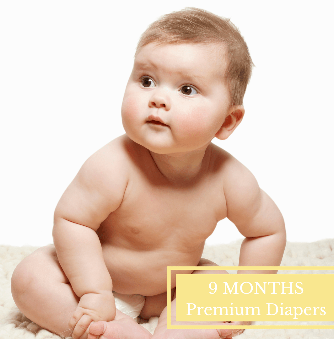 baby in tshirt and diapers laying on back used to advertise our 9 month premium diapers for baby