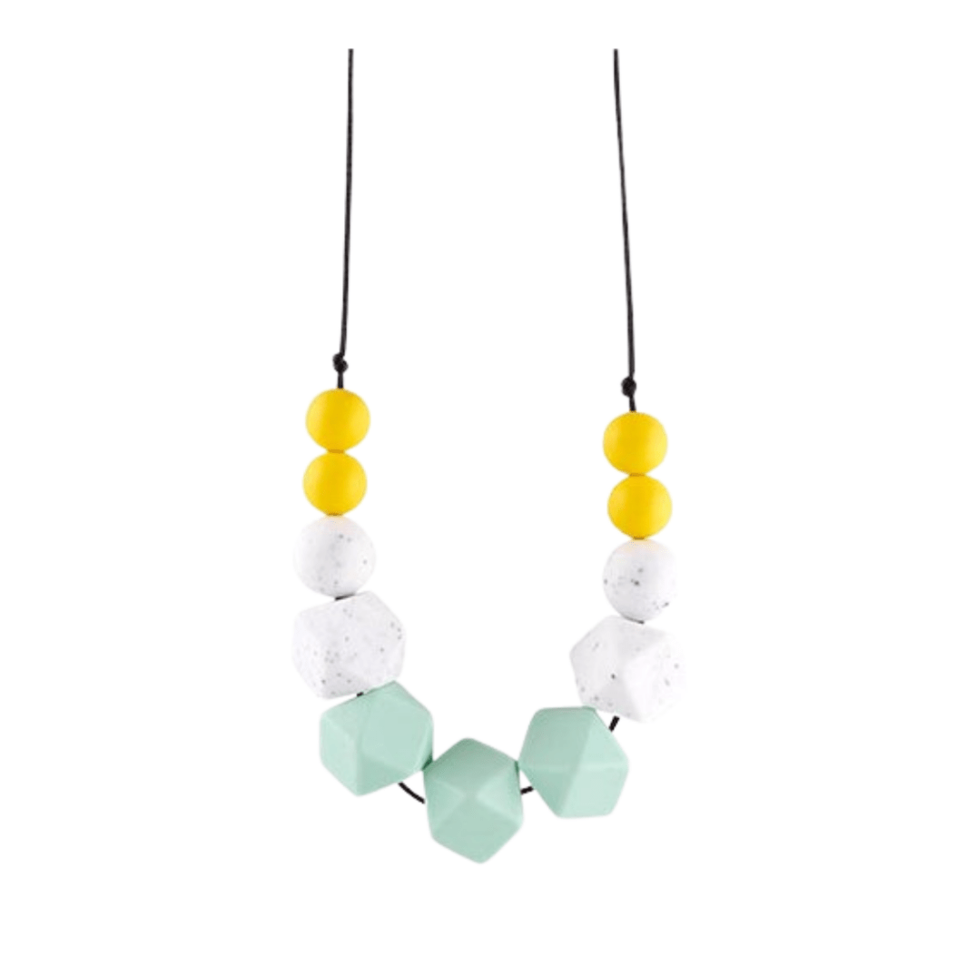 Mint Silicone Necklace This modern statement silicone teething necklace is for the fun loving mom! The necklace is made with soft BPA-free silicone beads that are perfect for your teething little one.